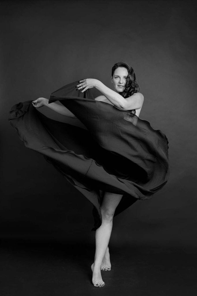 fine-art-boudoir-girl-dancing-with-black-skirt-topless