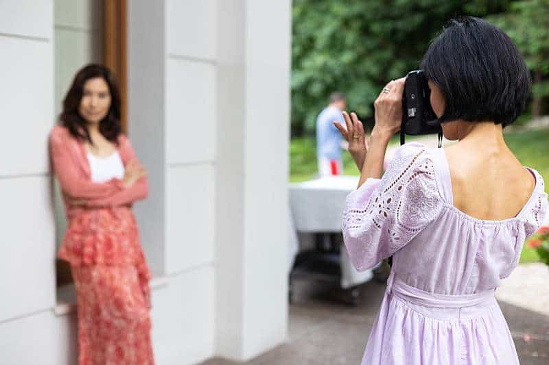why-does-professional-photography-cost-so-much-photographer-photographing-client-in-action-in-garde-setting